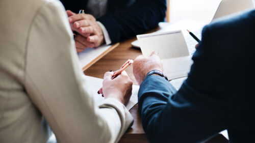 Couple Signing Legal Agreement