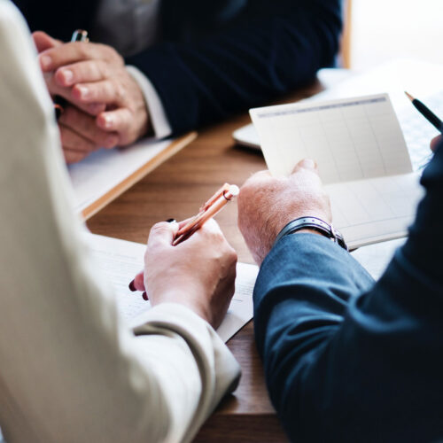 Couple Signing Legal Agreement