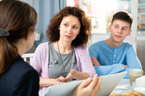 family lawyer for children meeting with mother and son