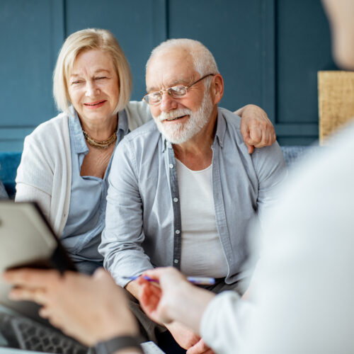 Do you need a lawyer for your estate plan? senior couple meeting with attorney to decide